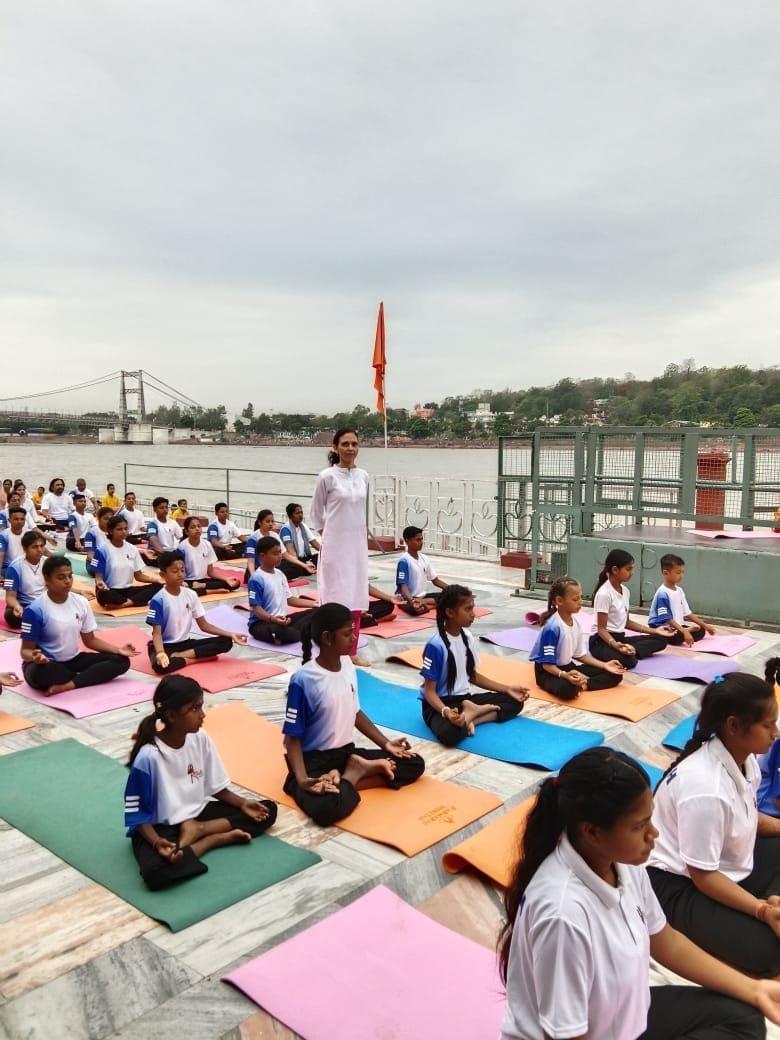 Mass practice on the bank of the Ganga